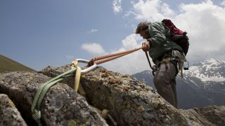 A climber beginning his descent