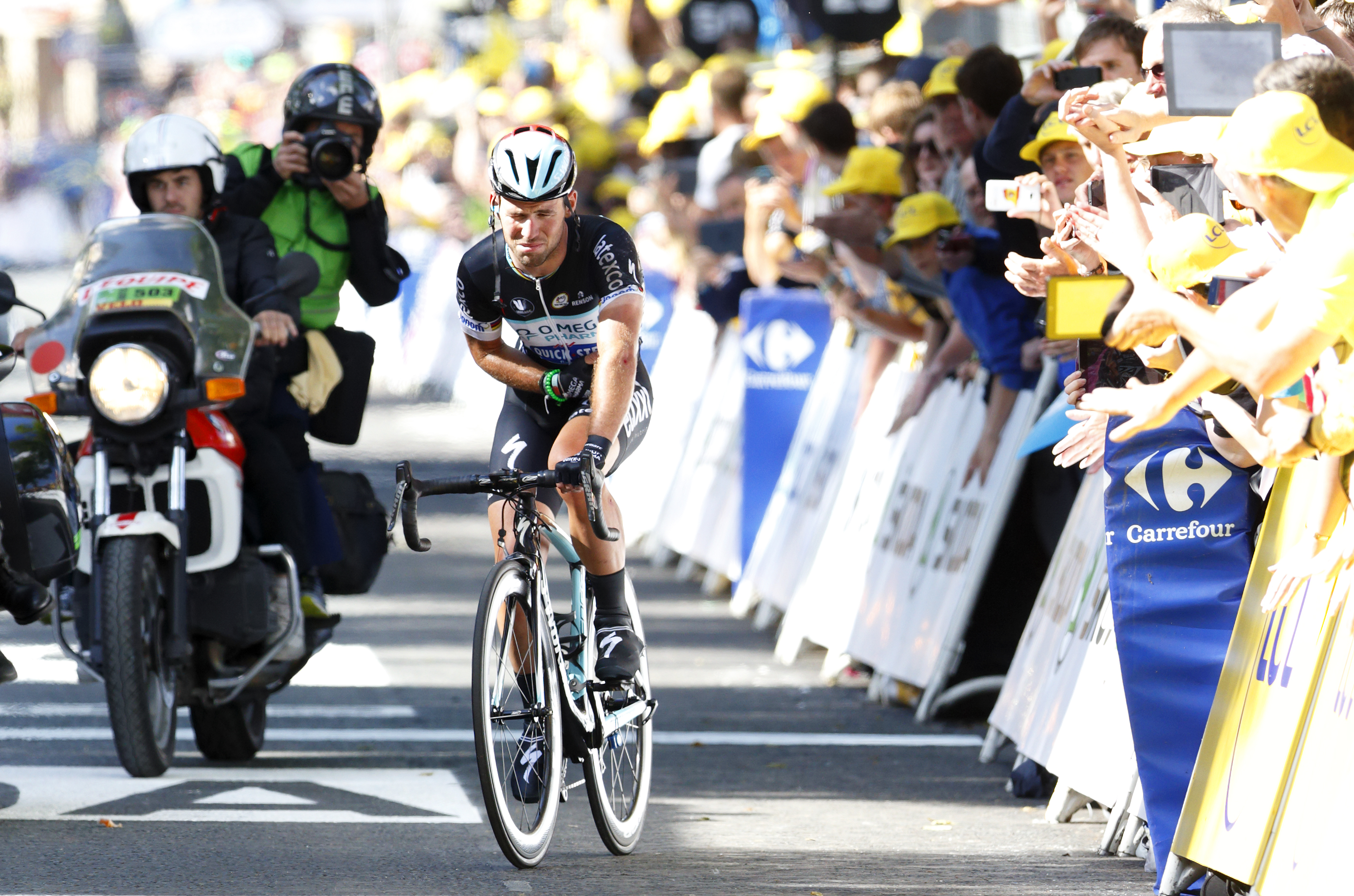 HARROGATE UNITED KINGDOM JULY 05 EMBARGOED FOR PUBLICATION IN UK NEWSPAPERS UNTIL 48 HOURS AFTER CREATE DATE AND TIME Mark Cavendish finishes stage one of the Tour de France after crashing just before the finish line on July 5 2014 in Harrogate England Photo by Max MumbyIndigoGetty Images