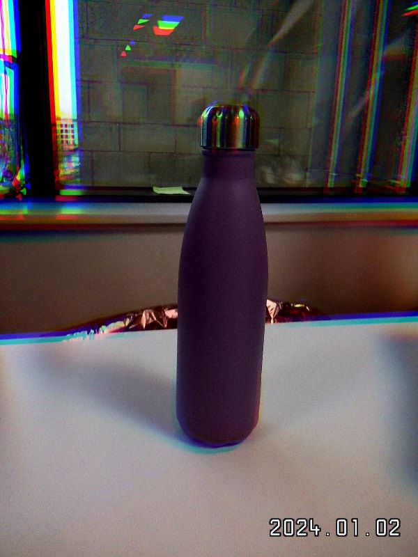 A purple Chillys bottle shot on the Leica Sofort 2