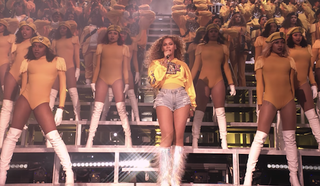 Beyonce and dancers on stage at Coachella 2018 in homecoming