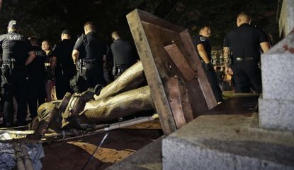Silent Sam after it was toppled over.