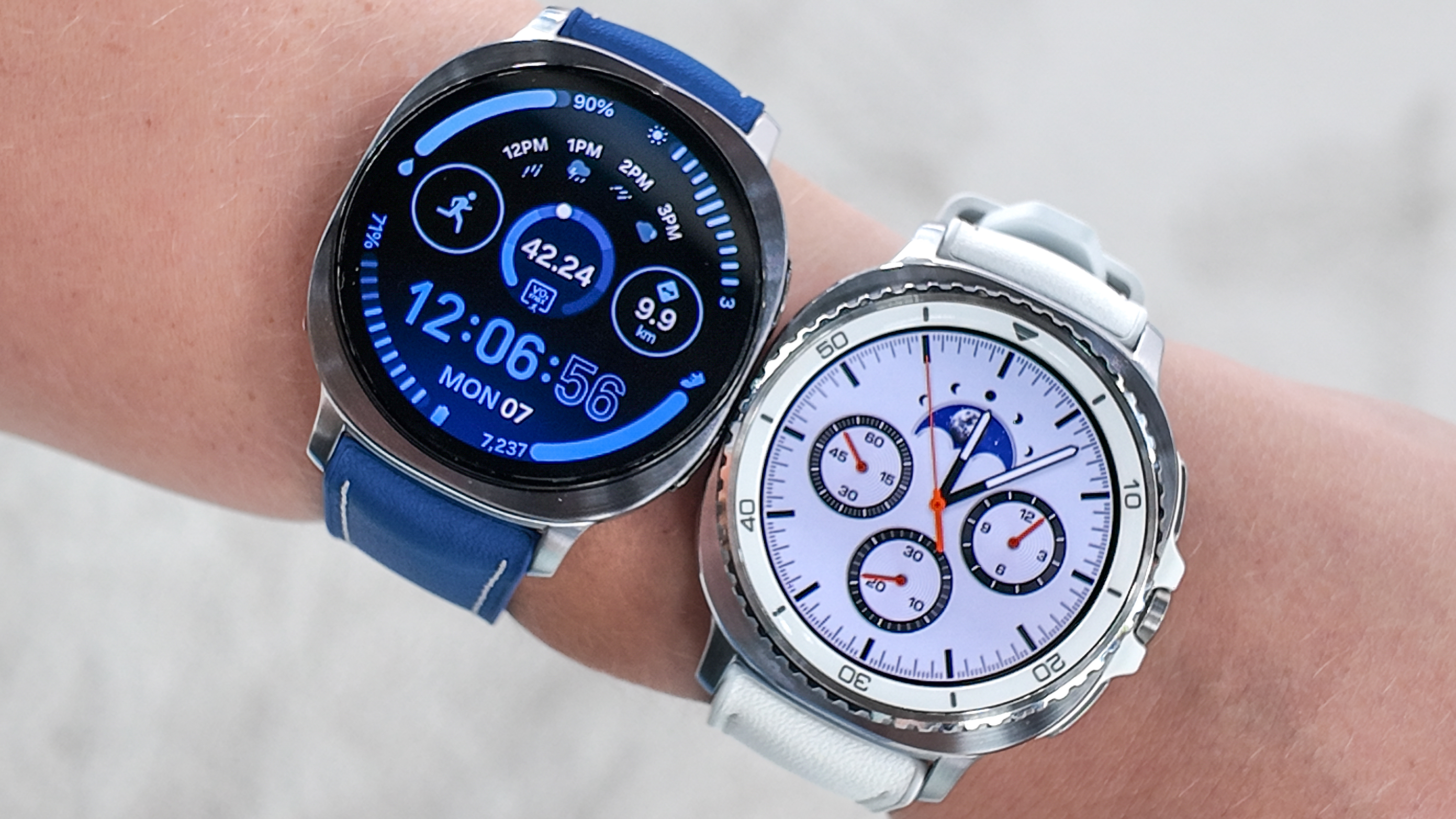 Close-up of the Samsung Galaxy Watch 8 and Galaxy 8 Classic on the writer's wrist