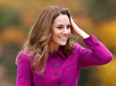 Kate Middleton plays with her hair