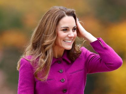 Kate Middleton plays with her hair