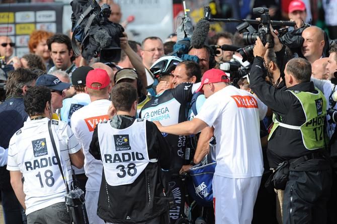 Tony Martin (Omega Pharma-Quickstep) swarmed by the media after his stage win