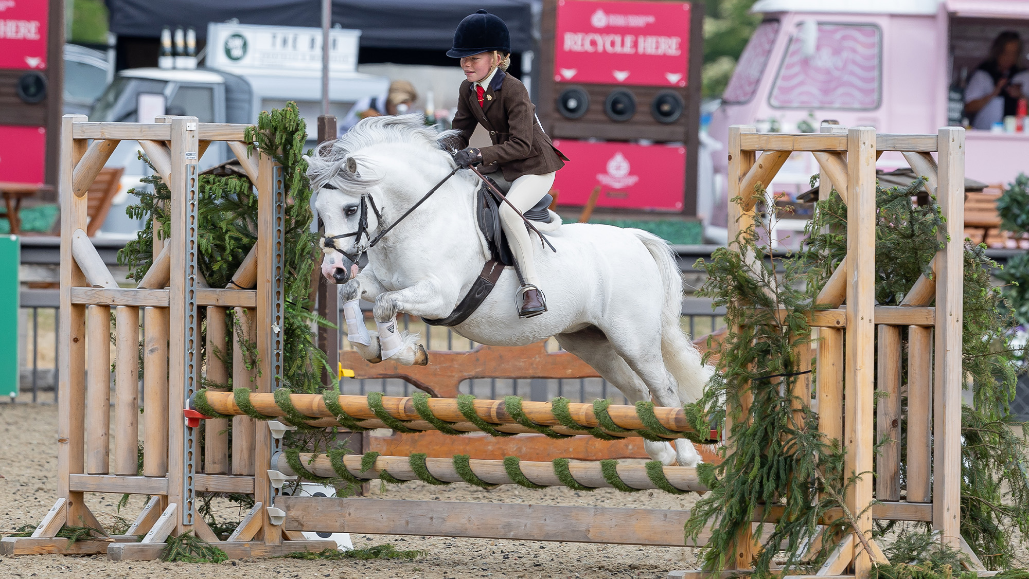 Poppy Rowlands riding Delami Brvado in the M&amp;amp;M working hunter pony class at Royal Windsor Horse Show