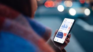 woman looking at a fintech app