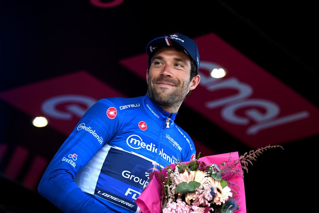 NAPLES ITALY MAY 11 Thibaut Pinot of France and Team Groupama FDJ Blue Mountain Jersey celebrates at podium during the 106th Giro dItalia 2023 Stage 6 a 162km stage from Naples to Naples UCIWT on May 11 2023 in Naples Italy Photo by Tim de WaeleGetty Images