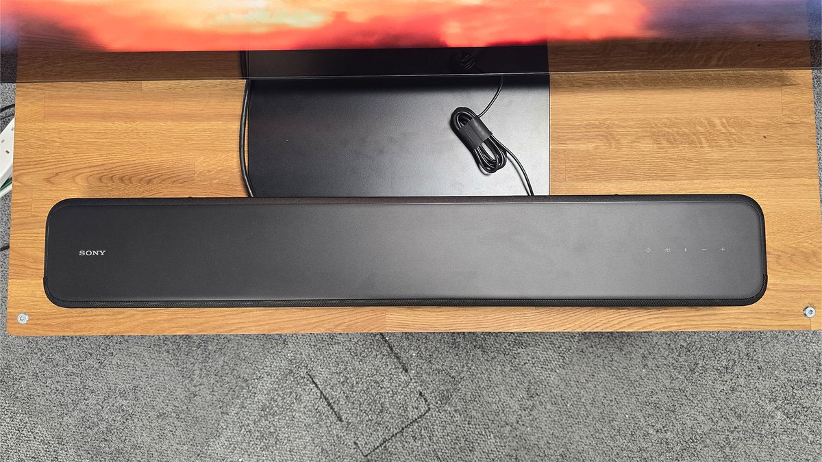 Sony HT-S2000 sitting below a TV