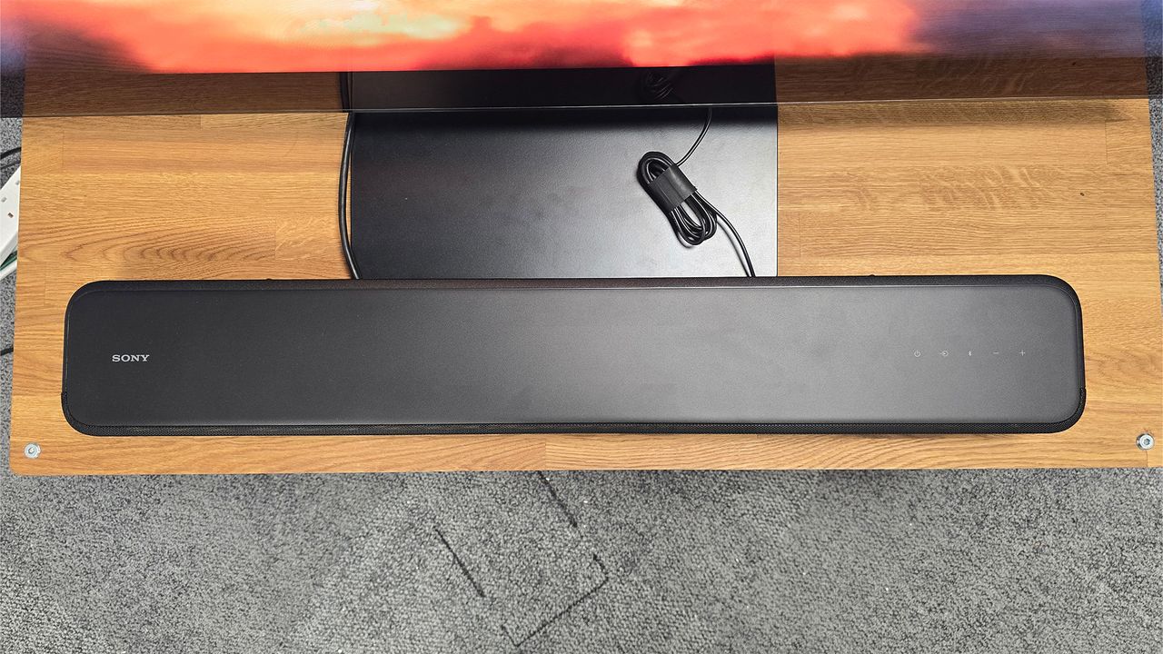 Sony HT-S2000 sitting below a TV