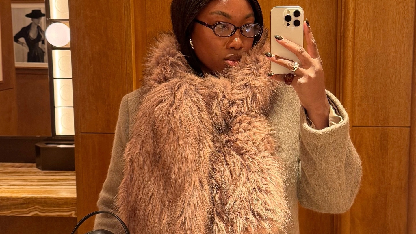 Nnenna Echem in a faux fur scarf and Sams&oslash;e Sams&oslash;e coat.