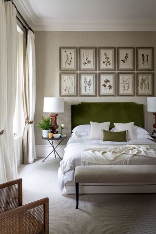 botanical art prints above bed in bedroom by Kitesgrove
