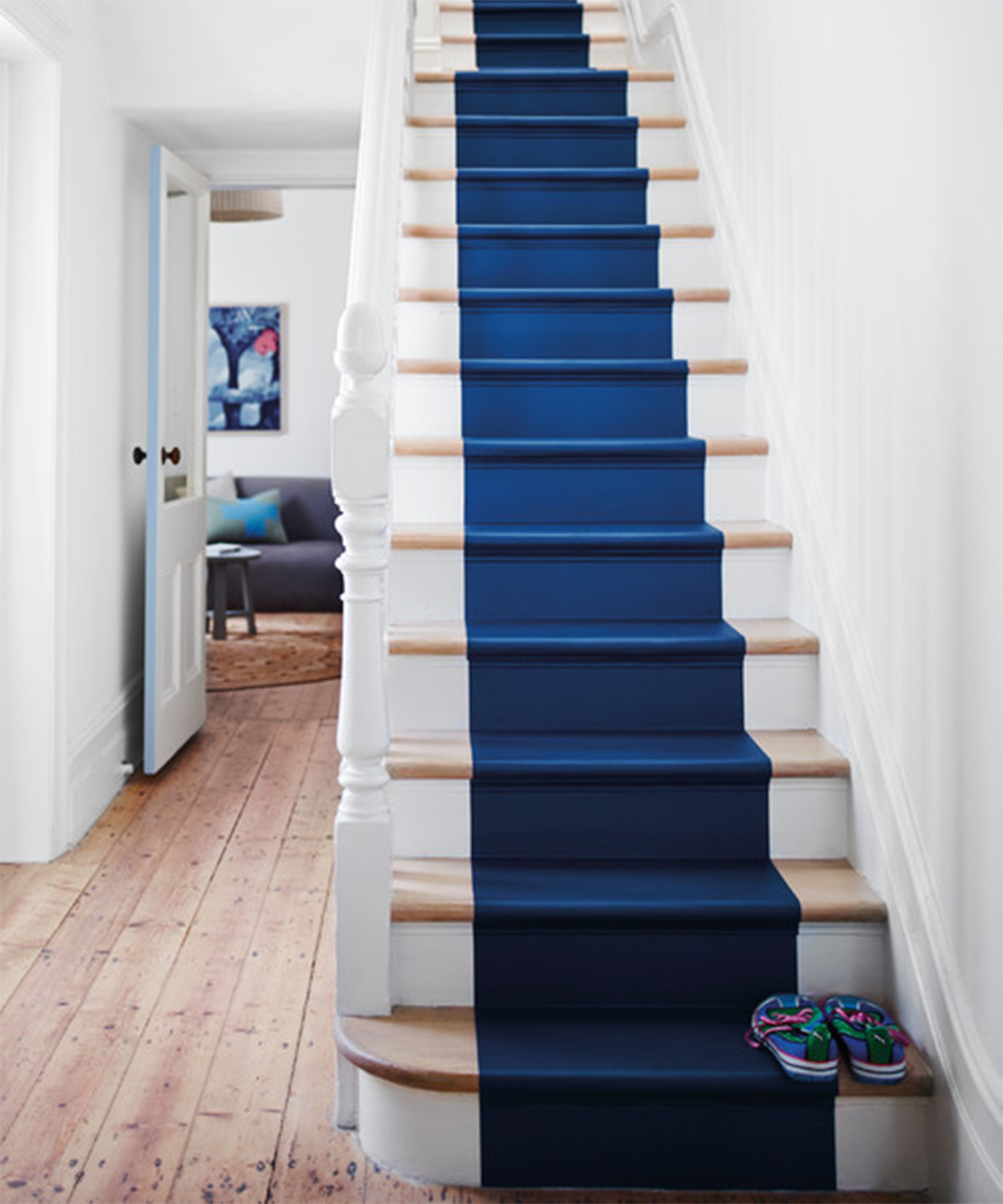 White and blue staircase in hallway by Dulux
