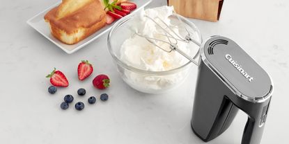 Image of Cuisinart mixer in lifestyle image with strawberries and cake 