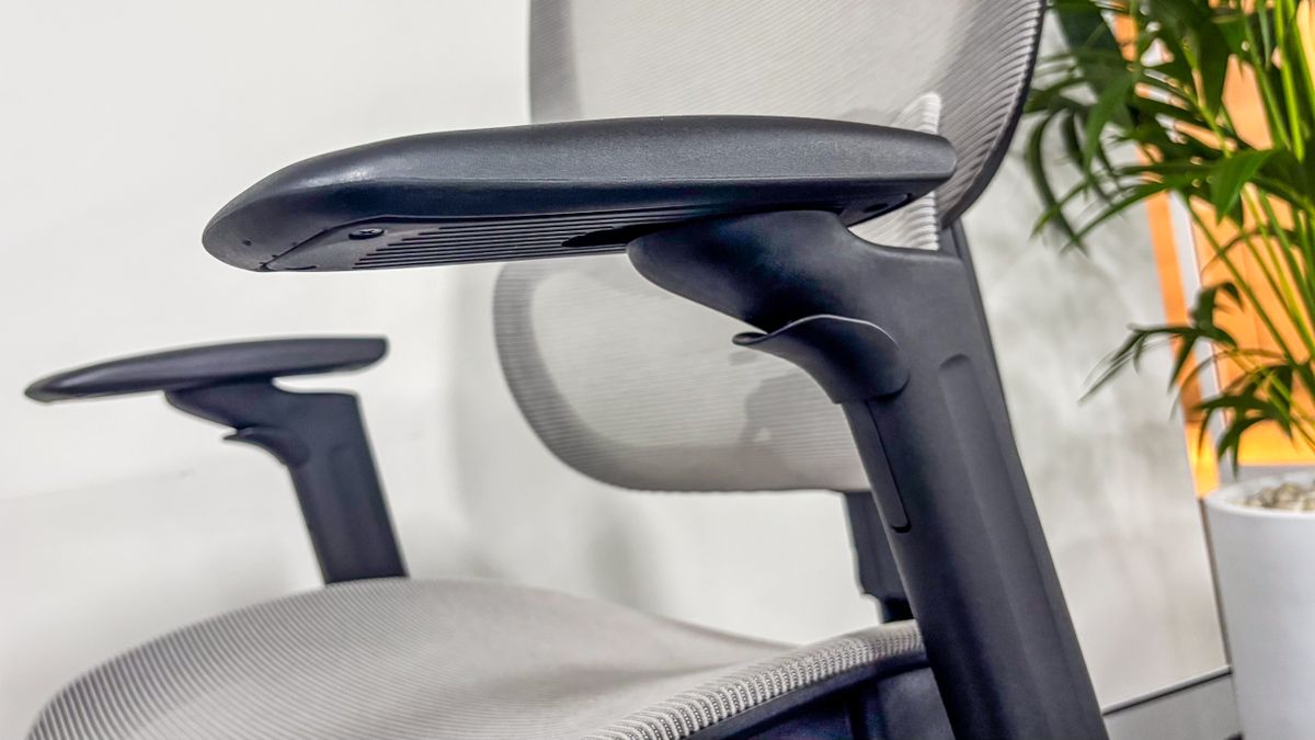 Armrest adjustment button on the ErgoTune Joobie