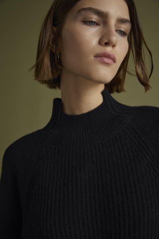 Woman in ribbed cashmere jumper