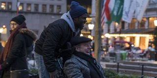 Kevin Hart and Bryan Cranston riding around in The Upside