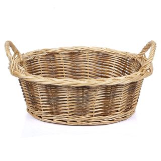 wicker gift basket on white background