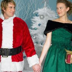 Couple Wearing Christmas Outfits
