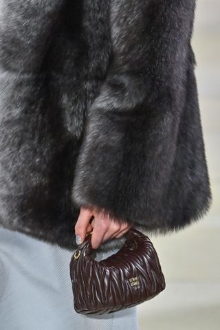 A model walks the runway during the Miu Miu Ready to Wear Fall/Winter 2025-2026 fashion show as part of the Paris Fashion Week