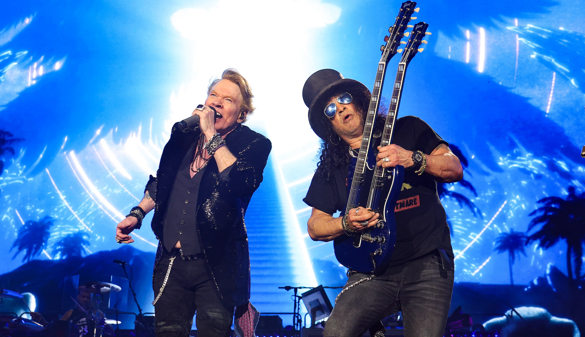 Axl Rose (left) and Slash perform onstage with Guns N' Roses at the Power Trip music festival at the Empire Polo Club in Indio, California October 6, 2023