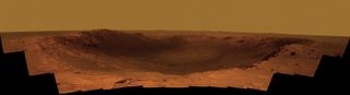 NASA's rover Opportunity will spend the seventh anniversary of its Mars landing at a crater called Santa Maria, which has a diameter about the length of a football field.