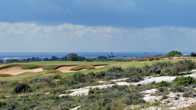 The eleventh hole at Eléa with the ocean in the distance