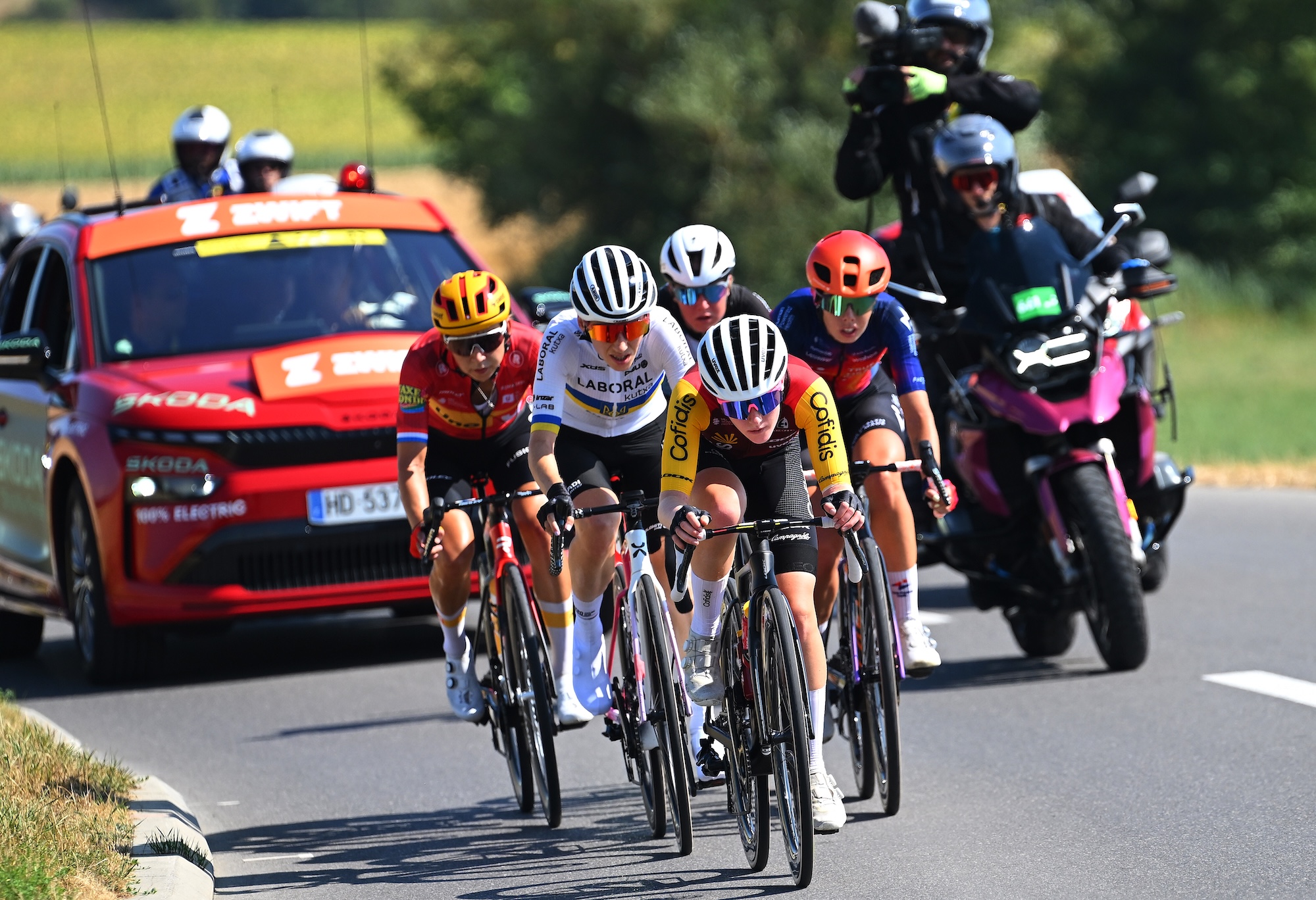 Anouska Koster, Yuliia Biriukova, Ema Comte, Carlotta Cipressi compete in the breakaway during the 5th Tour de France Femmes 2026, Stage 2