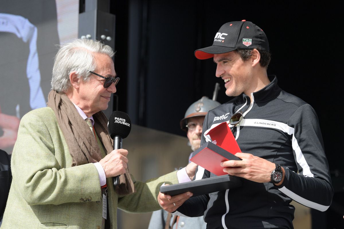 Greg Van Avermaet receives a gift