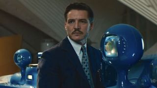Reed Richards worried in front of round computer screens in The Fantastic Four: First Steps