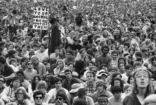 Black and white photo of a huge crown at Woodstock 69