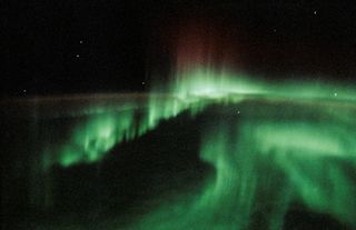 This 35mm frame represents one of the more spectacular views of Aurora Australis, photographed by the Space Shuttle Endeavour during the eight-day Spacelab-J mission.