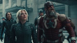 Ghost, Yelena, Red Guardian, and John Walker looking shocked at something happening off-camera in Marvel's Thunderbolts movie