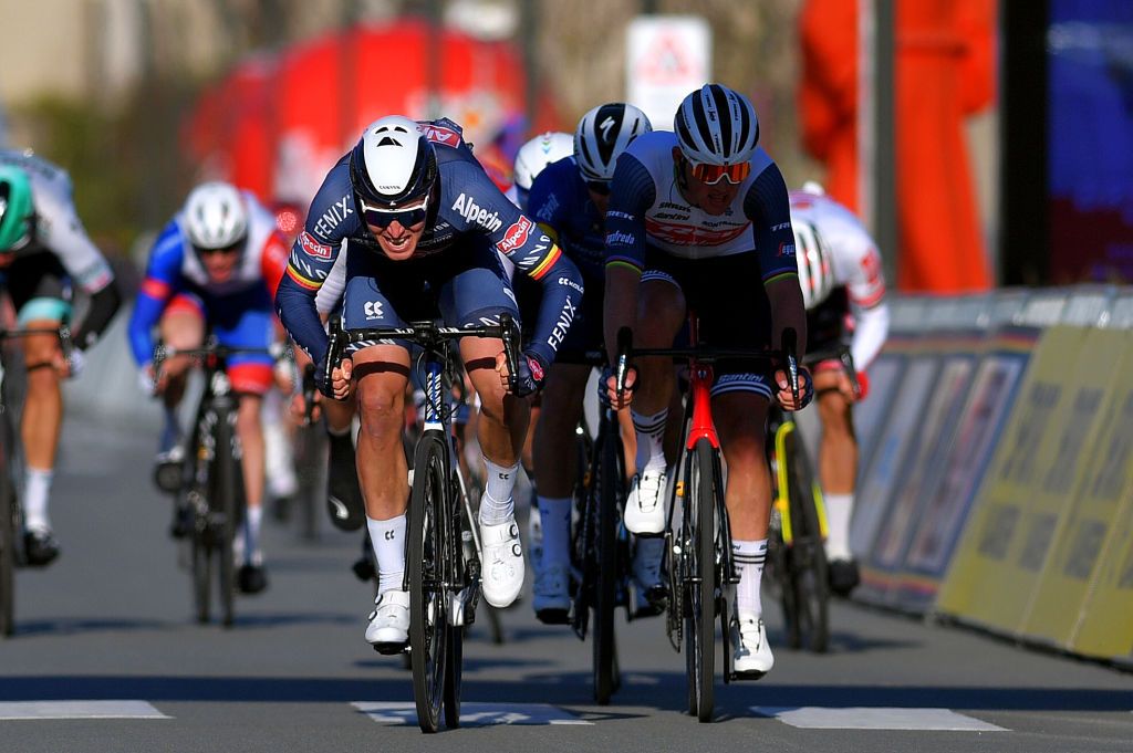 KOKSIJDE BELGIUM MARCH 19 Sprint Arrival Tim Merlier of Belgium and Team AlpecinFenix Mads Pedersen of Denmark and Team Trek Segafredo Florian Senechal of France and Team Deceuninck QuickStep during the 19th Bredene Koksijde Classic 2021 a 199km race from Bredene to Koksijde BredeneKoksijde on March 19 2021 in Koksijde Belgium Photo by Luc ClaessenGetty Images