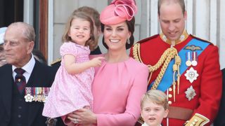 Kate Middleton holds Princess Charlotte during Trooping the Colour