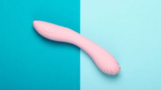 A pink sex toy on blue background of two different shades