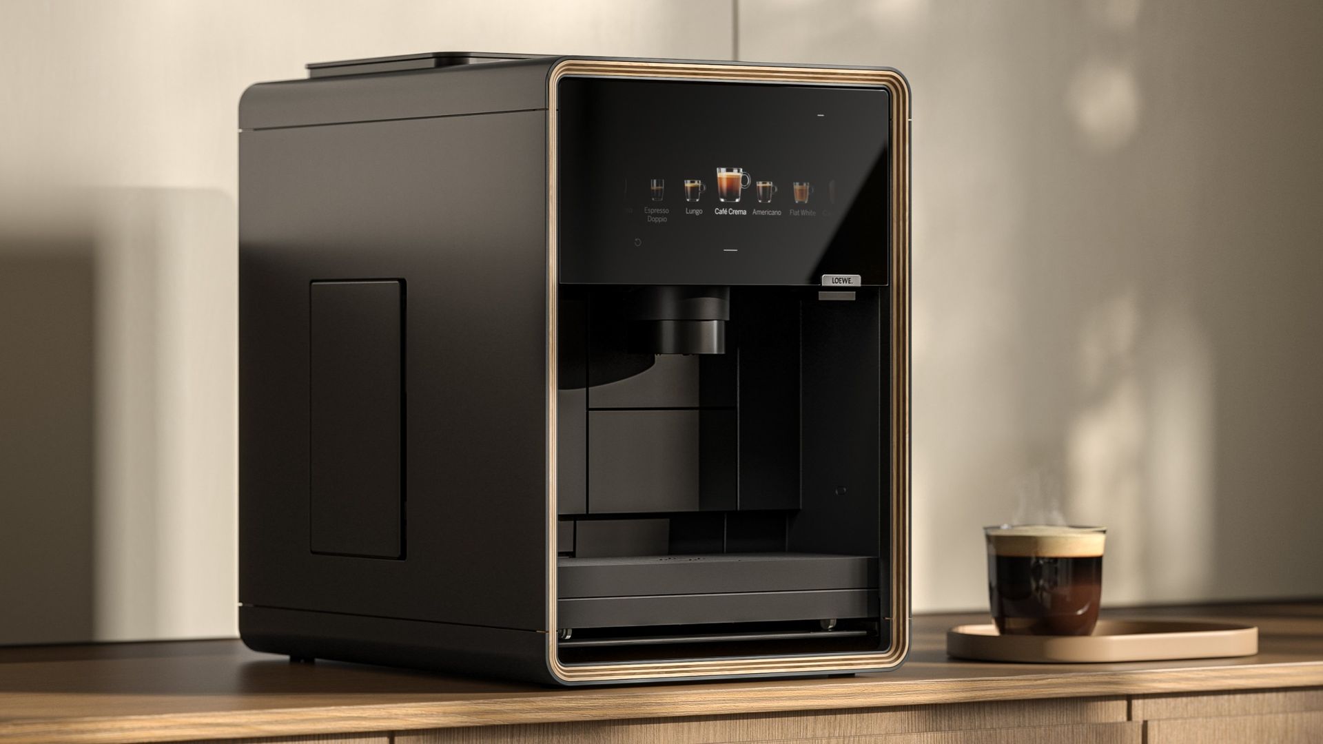 Loewe aura.matic espresso machine on table