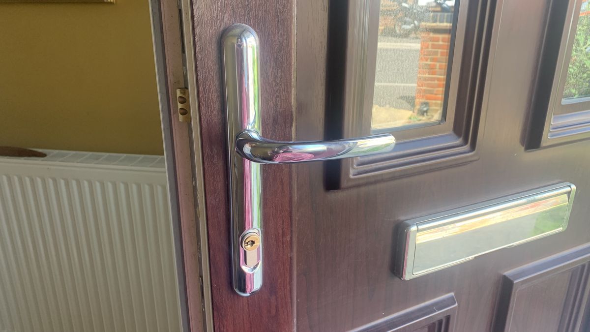 Ultion Nuki smart lock installed on a front door