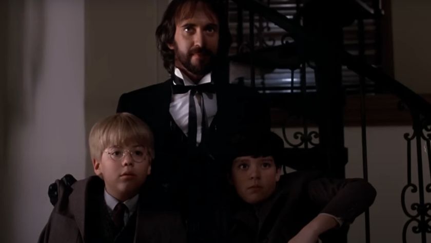 Jonathan Pryce keeps a grip on Vidal Peterson and Shawn Carson in Something Wicked This Way Comes.