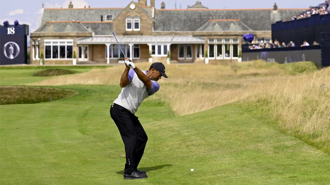 Tiger Woods of the United States plays his second shot on the 18th hole prior to The 152nd Open championship at Royal Troon 