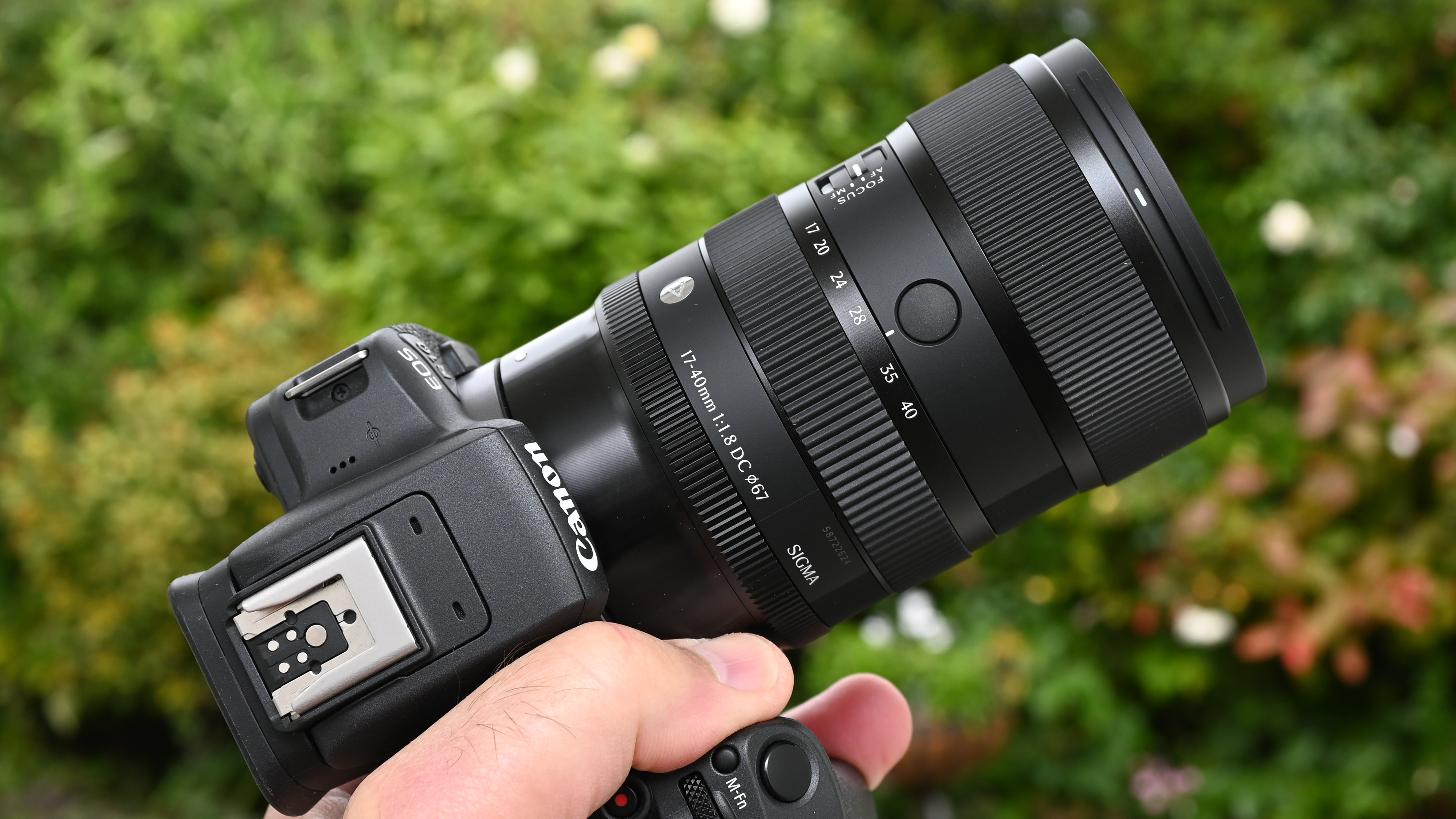 Sigma 17-40mm f/1.8 DC | A product shot held in hand