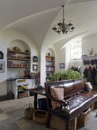 country house boot room with leather bench seating