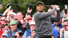 Tiger Woods hits a shot