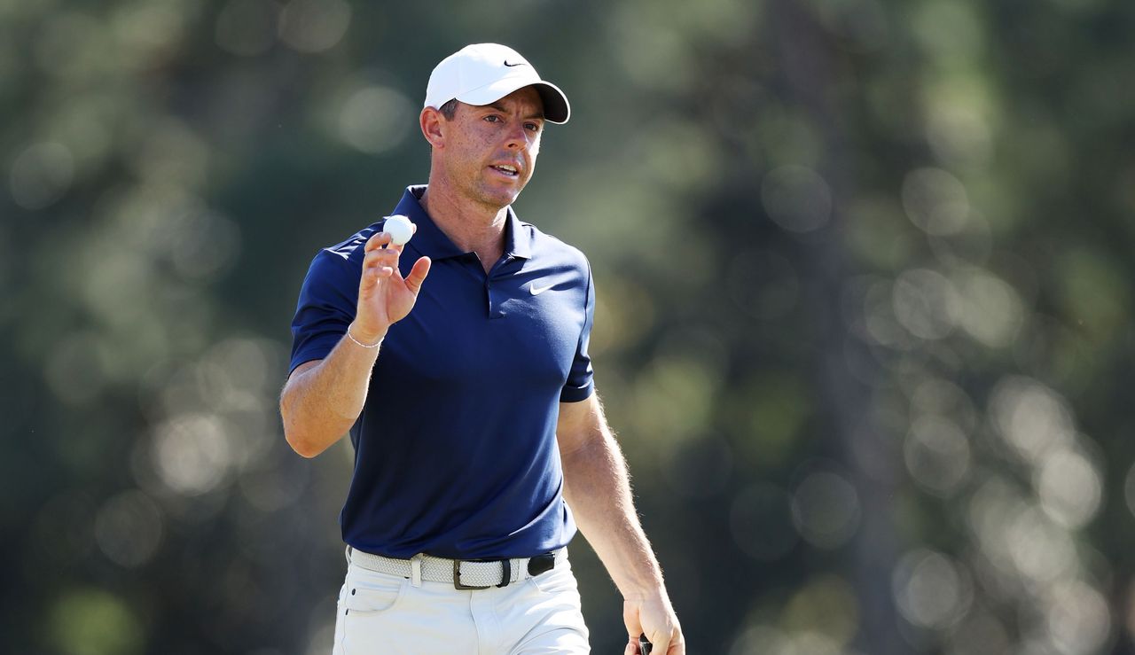 Rory McIlroy waves to the crowd