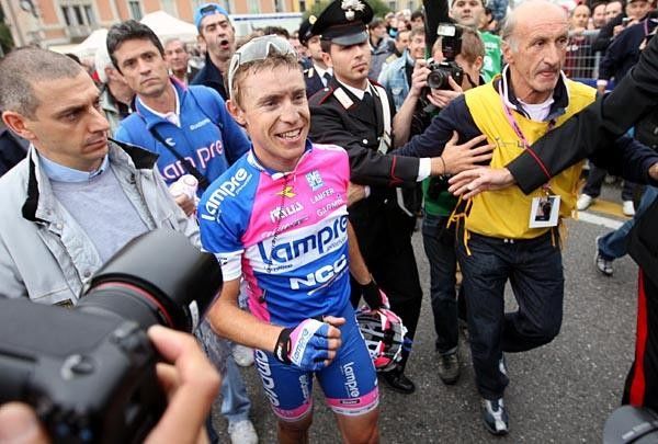 The usual scrum surrounded Damiano Cunego after his win