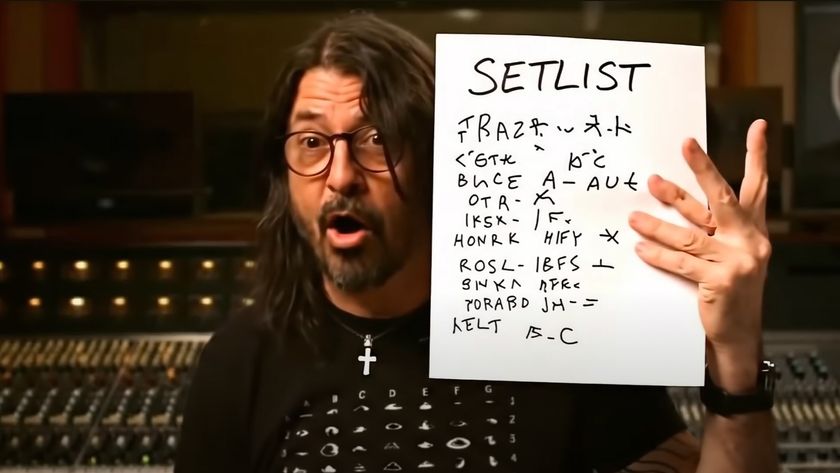 AI Dave Grohl holding up a &#039;setlist&#039; of gibberish with 6 fingers 