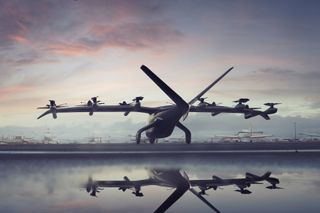 Midnight eVTOL by Archer Aviation reflected in puddle on runway