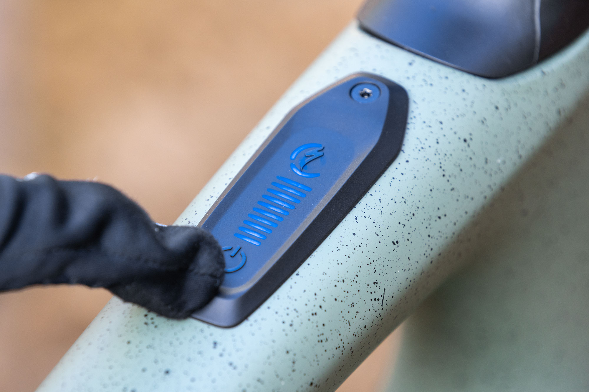 Specialized Creo TCU, with on button about to be pressed