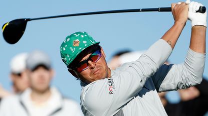 Rickie Fowler hits his tee shot on the 15th hole during the 2022 WM Phoenix Open