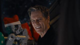 Kevin Bacon smiling at Drax in the Guardians of the Galaxy holiday special